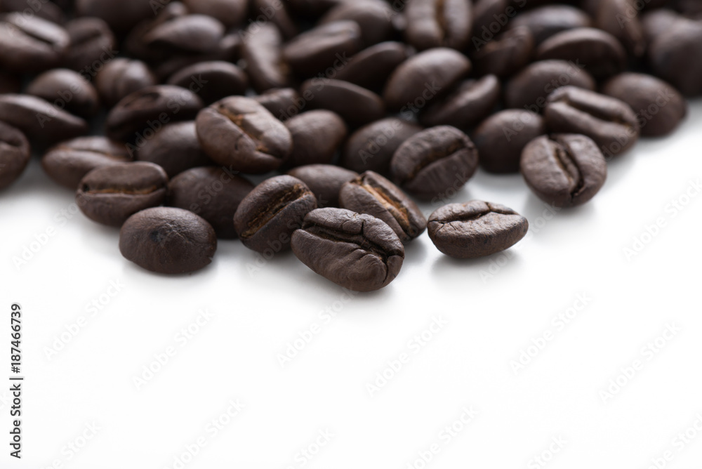 coffee beans isolated on white background
coffee beans isolated on white background