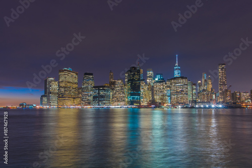 Manhattan's Financial district skyline at night from the Brooklyn Bridge Park, New York City