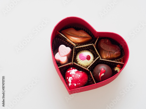 Valentine chocolate gift box in heart shape isolated over white background