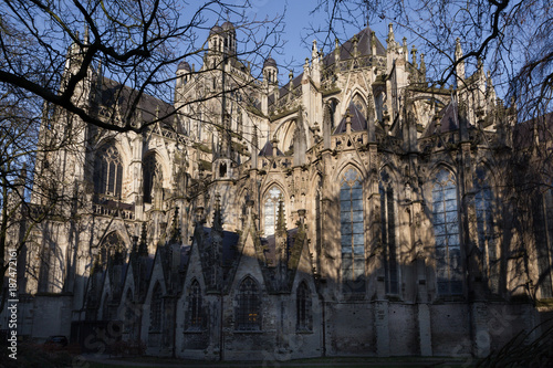 Creative view at the cathedral Church of St. John (Sint-Janskathedraal) of 's-Hertogenbosch, Netherlands photo