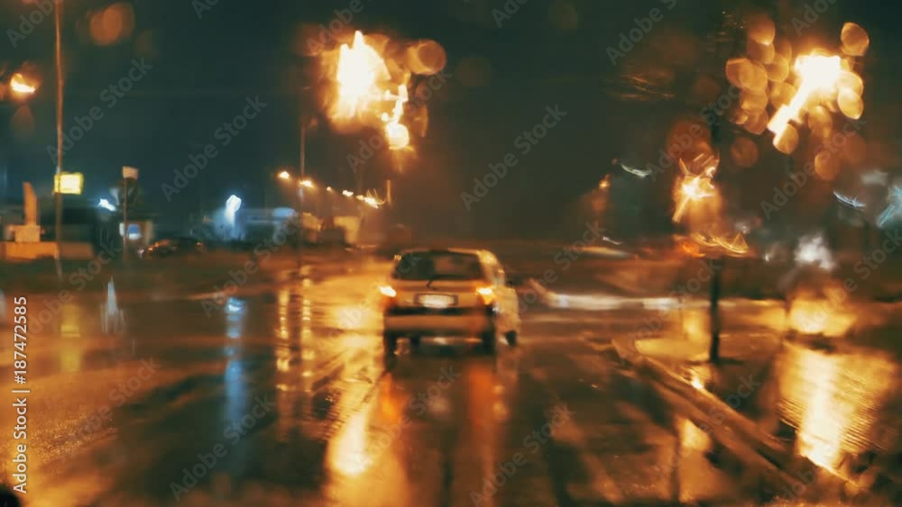 urban street traffic on the rainy night urban street traffic on the rainy night