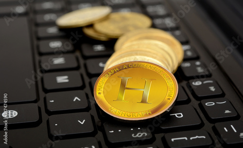 Hashgraph Crypto Currency coin on keyboard photo