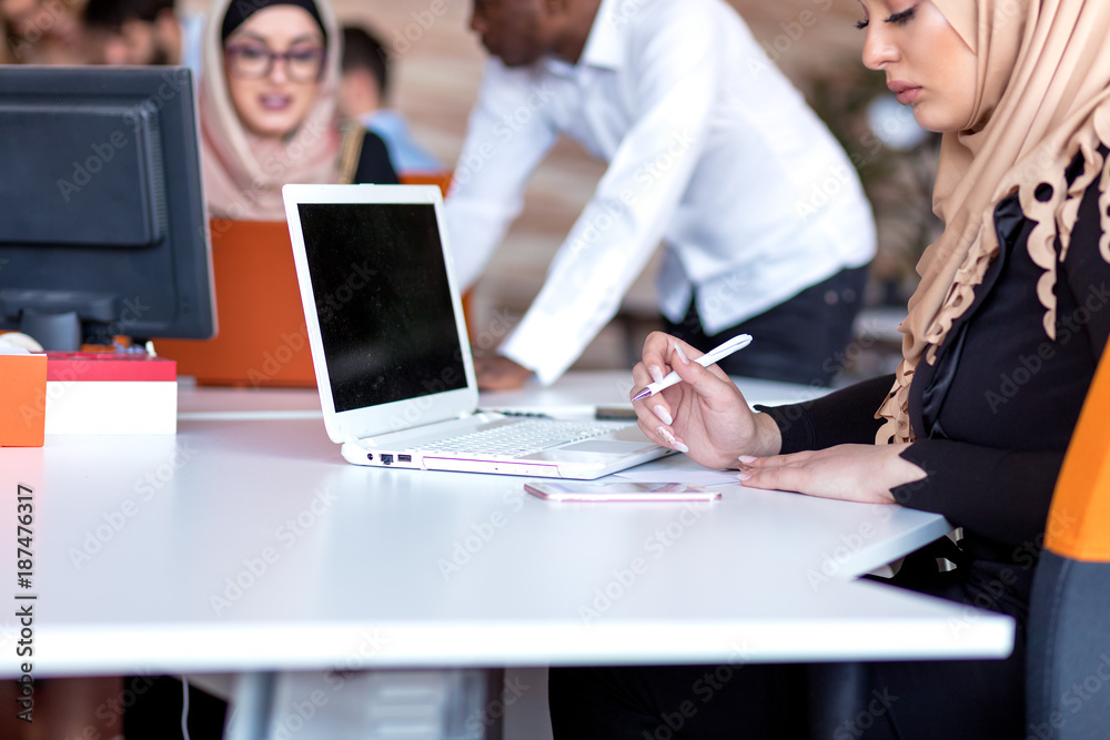 Young business people working at office on new project. startup, concept , team Young business people working at office on new project. startup, concept , team