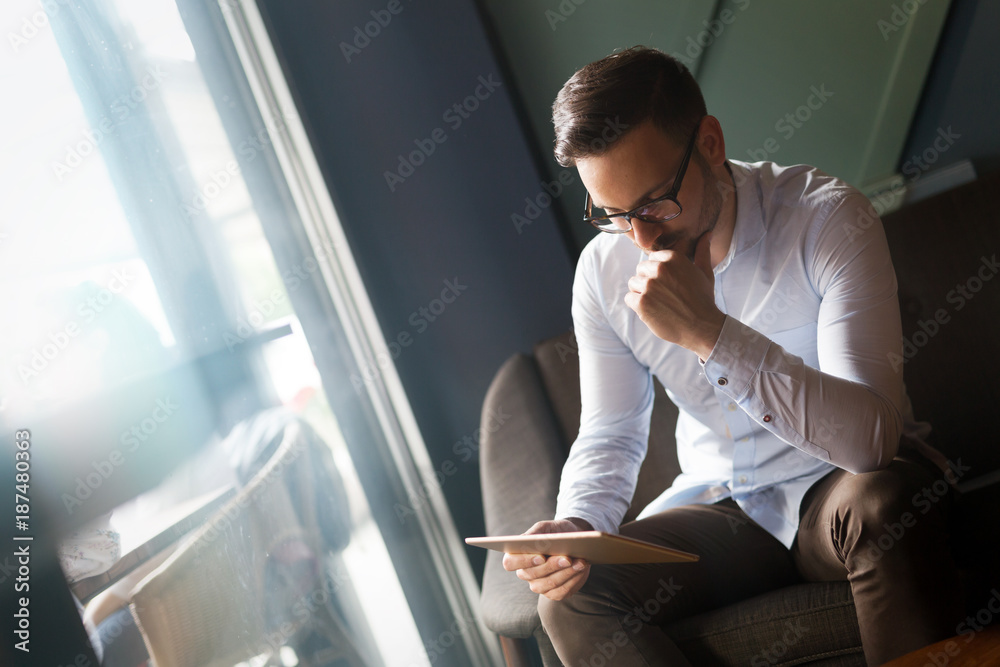 Portait of young handsome businessman in glasses Portait of young handsome businessman in glasses