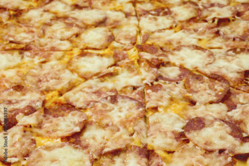 
Pizza with salami and cheese as background
