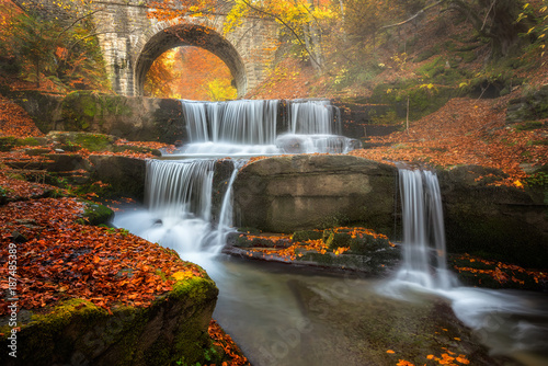 Autumn river /
Autumn view with a river and an old bridge, Bulgaria photo