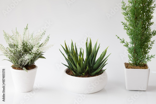 3 in 1 of Fake flower in white flower pot and on white background.