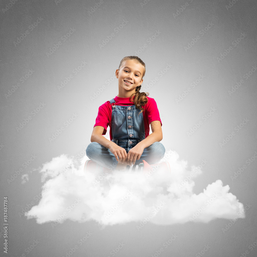 Concept of careless happy childhood with girl dreaming about something Concept of careless happy childhood with girl dreaming about something
