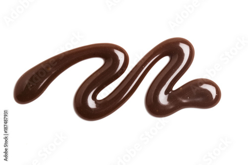 Chocolate caramel sauce ripple on a plain white backround