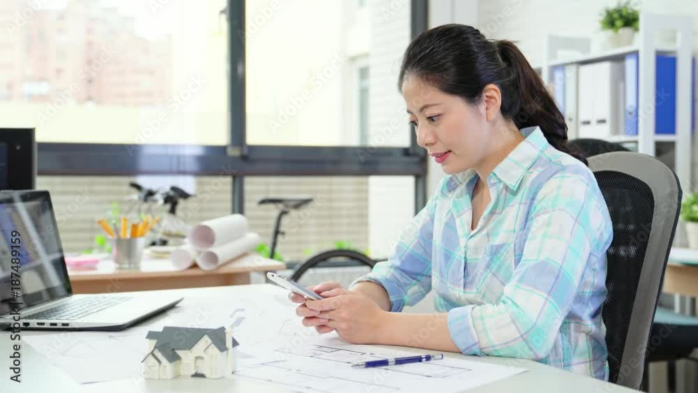 Skilled female architect chatting with client Skilled female architect chatting with client