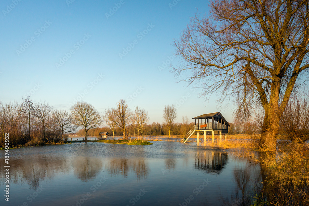 Birdwatching hut in a flooded Dutch nature reserve