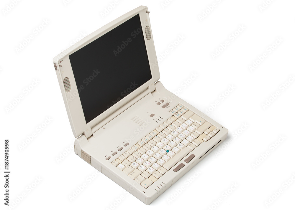 Old laptop computer isolated on white background