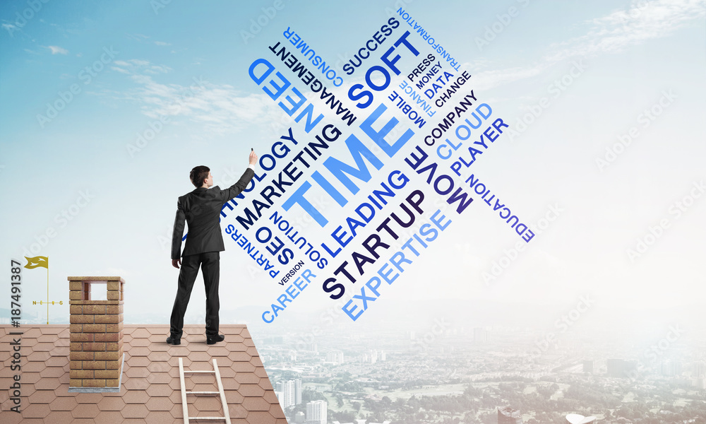 Young businessman standing on house roof and writing leadership skill concept. Mixed media Young businessman standing on house roof and writing leadership skill concept. Mixed media