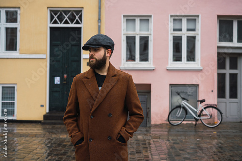 Bearded man in coat photo