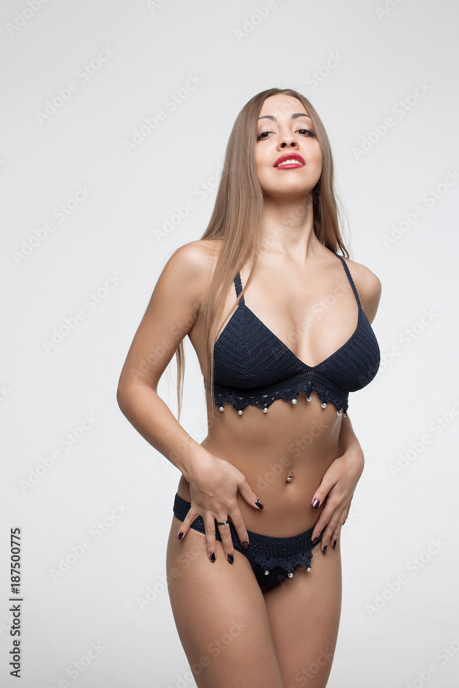 Young beautiful girl shows her gorgeous Breasts Stock Photo
