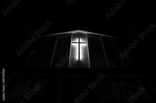 black and white lighted cross at night