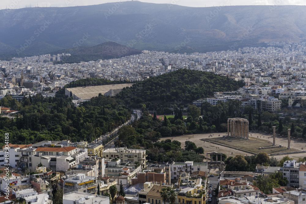 Athens, Greece day view of Temple of Olympian Zeus from Acropolis Hill. Also visible to the left Panathenaic Stadium, site of the first modern Olympic games in 1896.