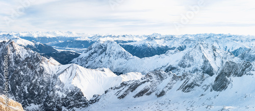 Aerial panorama of snowy mountain summits