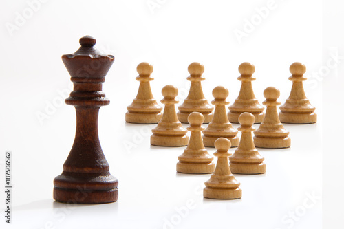 Business concept - chess - evil king and good employees - competition