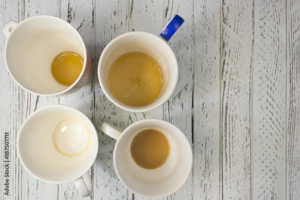 Empty cups of tea and coffee. Empty cups of tea and coffee.