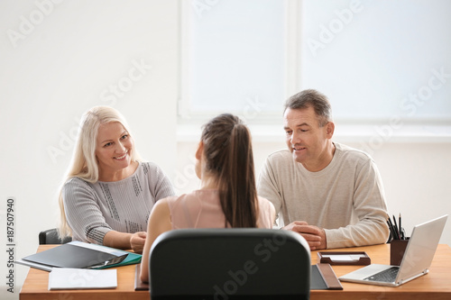 Mature couple at notary public office © Africa Studio