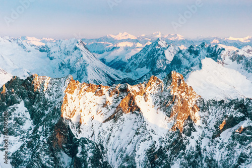 Aerial View Of Snowy Rocky Mountain Ridges In Sunset Stock Photo Adobe Stock Aerial View Of Snowy Rocky Mountain Ridges In Sunset Stock Photo Adobe Stock