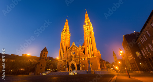 Bild auf Leinwand Illustration of view on Cathedral in night light of Szeged