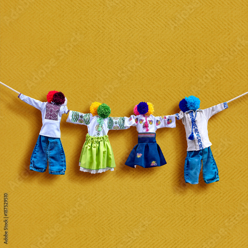 Handmade textile dolls on background, traditional ukrainian folk rag doll Motanka in ethnic style, ancient culture folk crafts tradition of Ukraine. Most Popular Souvenirs From Ukraine.