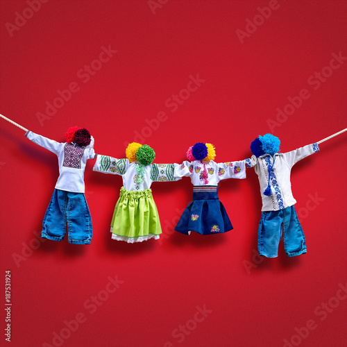 Handmade textile dolls on background, traditional ukrainian folk rag doll Motanka in ethnic style, ancient culture folk crafts tradition of Ukraine. Most Popular Souvenirs From Ukraine.
