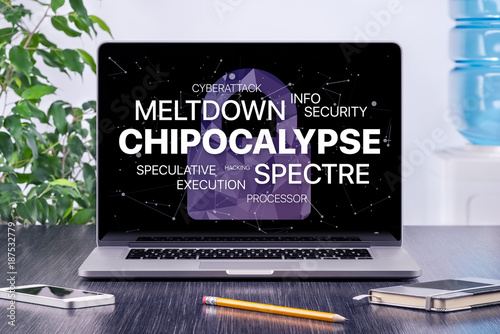 Chipocalypse concept with meltdown and spectre threat on laptop screen in office workspace photo