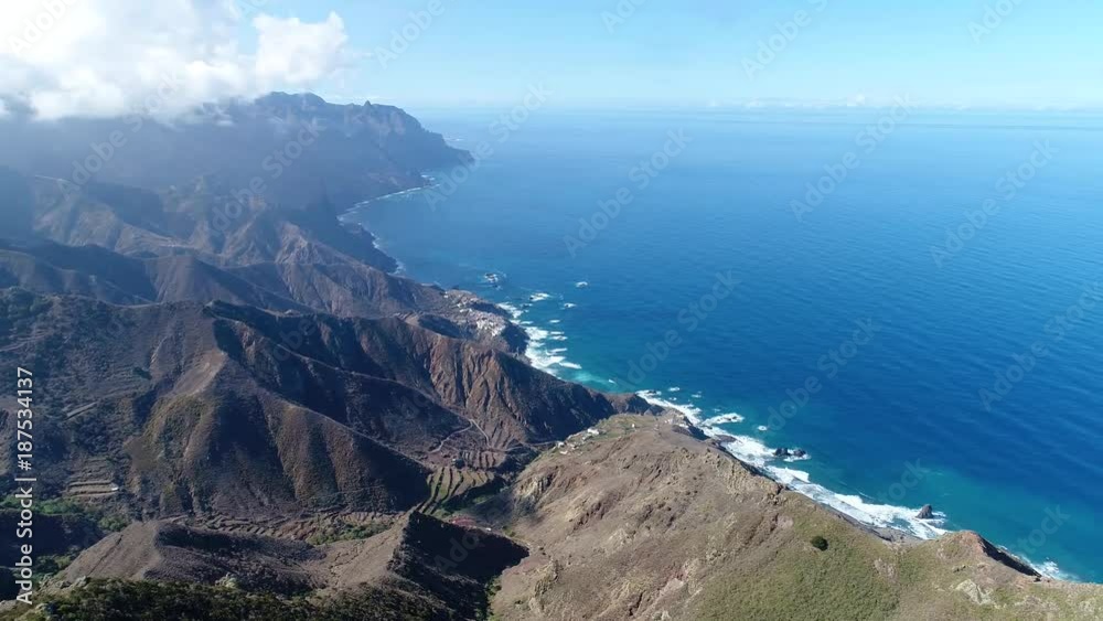 Flight over beautiful mountains near ocean shore Flight over beautiful mountains near ocean shore