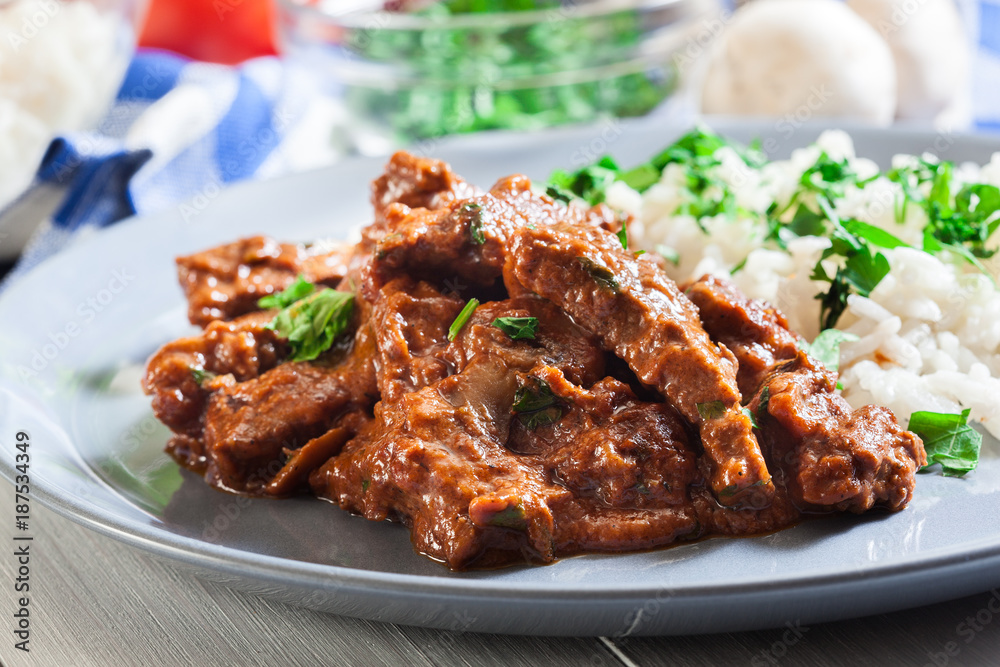 Beef Stroganoff served with rice Beef Stroganoff served with rice