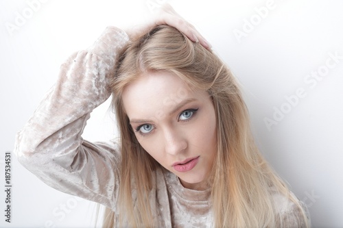 portrait of a stylish confident young woman with daily make-up.