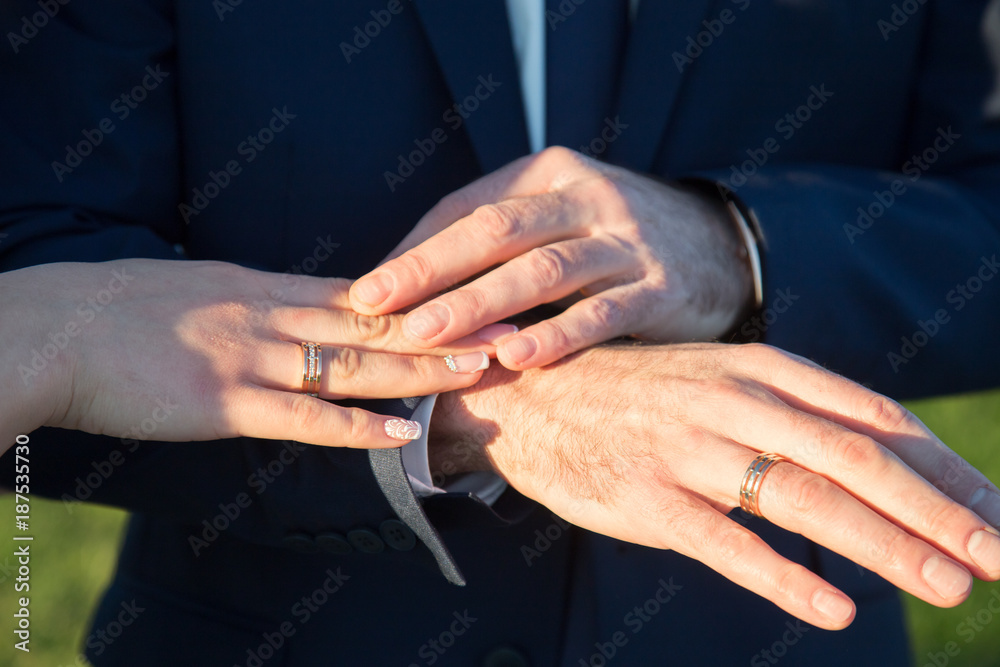 Hands with the wedding rings