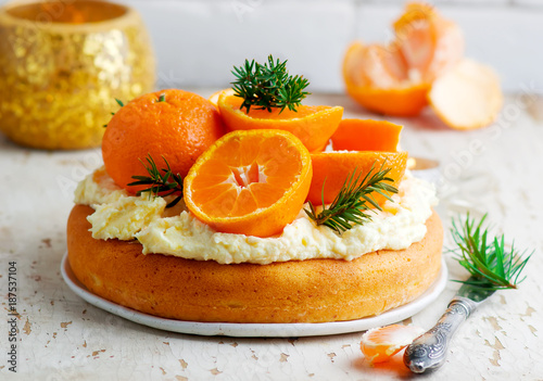 fresh tangerine cake with cream cheese frosting.