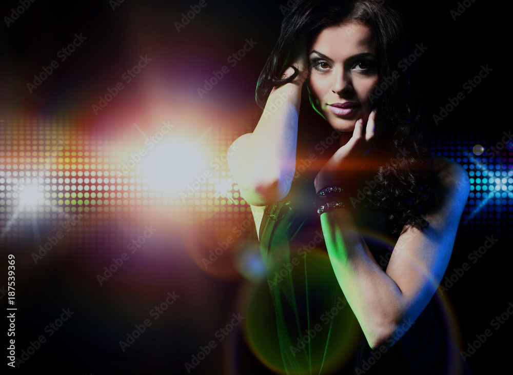 Portrait of dancing girl on disco party.