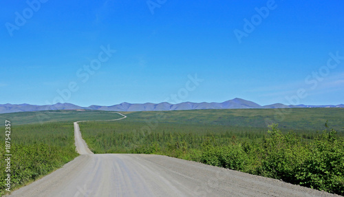 Endless Dempster Highway near the arctic circle, remote gravel road leading from Dawson City to Inuvik, Canada photo
