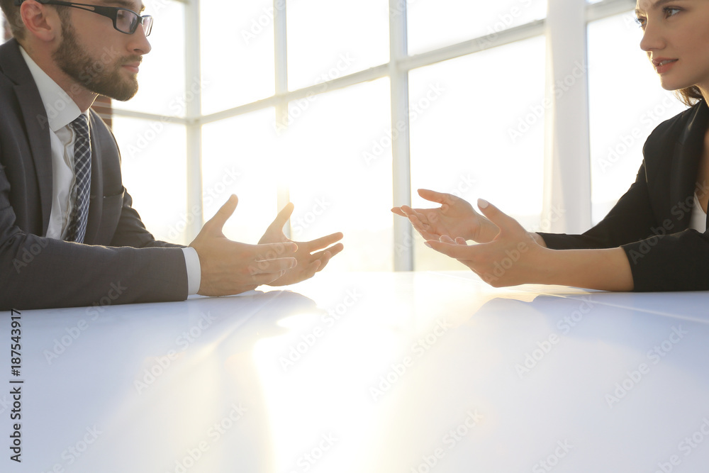 Business people Having Meeting Around Table In Modern Office Business people Having Meeting Around Table In Modern Office