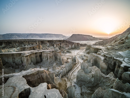 aerial view of rugged desert landscape at sunset, queshm island,