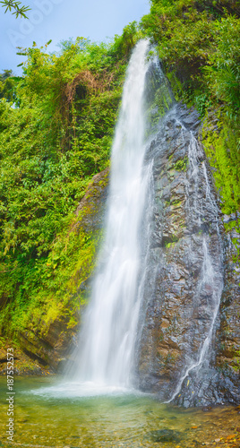 Beautiful Kaeng Nyui Waterfalls. Laos landscape. Vertical panorama