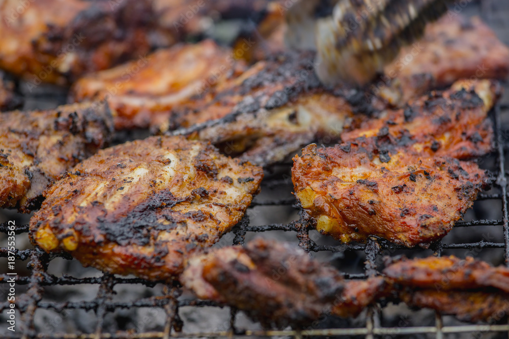 close up grilled pork ribs on the grill.