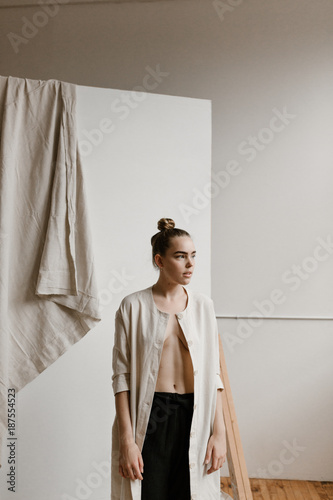 woman wearing open light jacket with nothing underneath Stock Photo