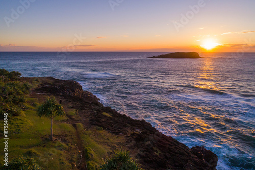 Aerial View over Fingal Head lighthouse at sunrise