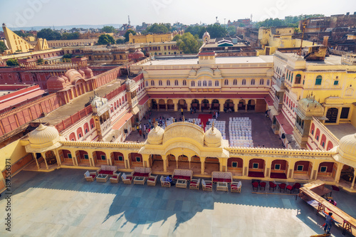 Aerial view of City Palace Jaipur Rajasthan with distant cityscape