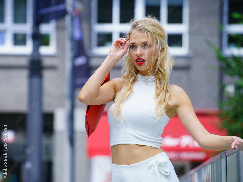 Blonde woman in city