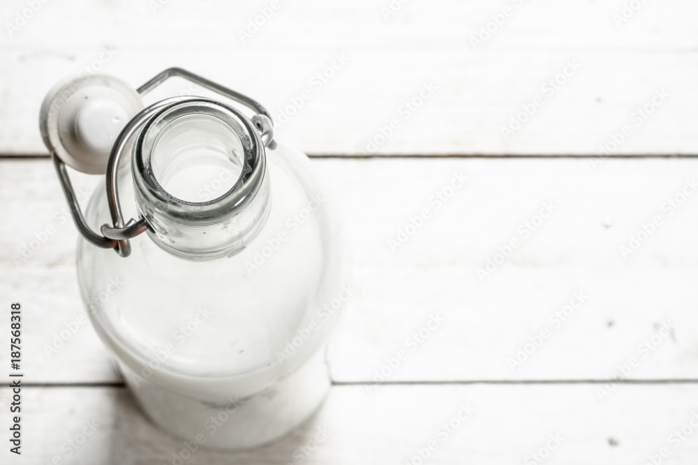 Fresh milk in bottle . Fresh milk in bottle .