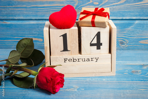 Date of 14 February on calendar, gift, red heart and rose flower, Valentines day concept