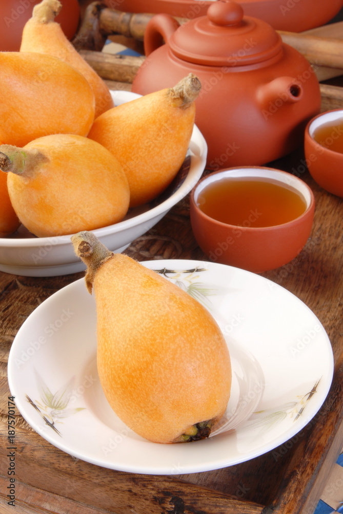 Loquat in the white plate Loquat in the white plate