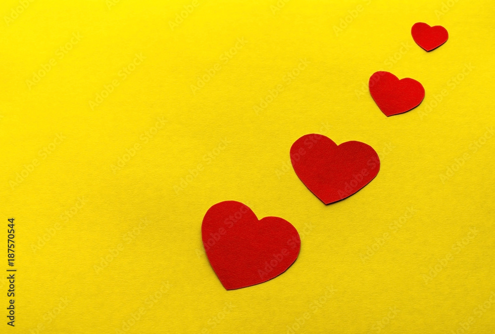 red hearts on a yellow background