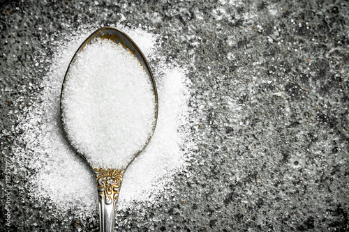 Sugar in a teaspoon.